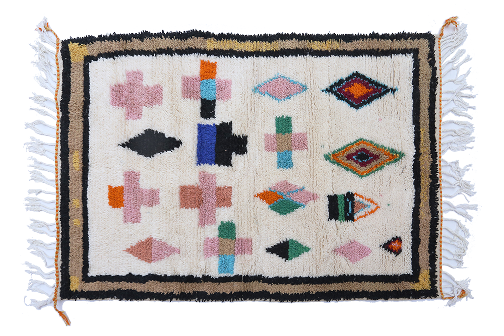 Large white Azilal Berber carpet with blue, pink, green, yellow and black outlines 