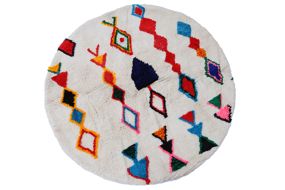 Azilal round Berber carpet with red, blue, yellow and black lozenges
