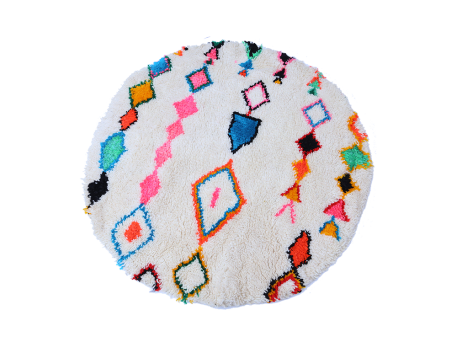 Azilal round white Berber carpet with pink, red, orange, blue, green and yellow lozenges