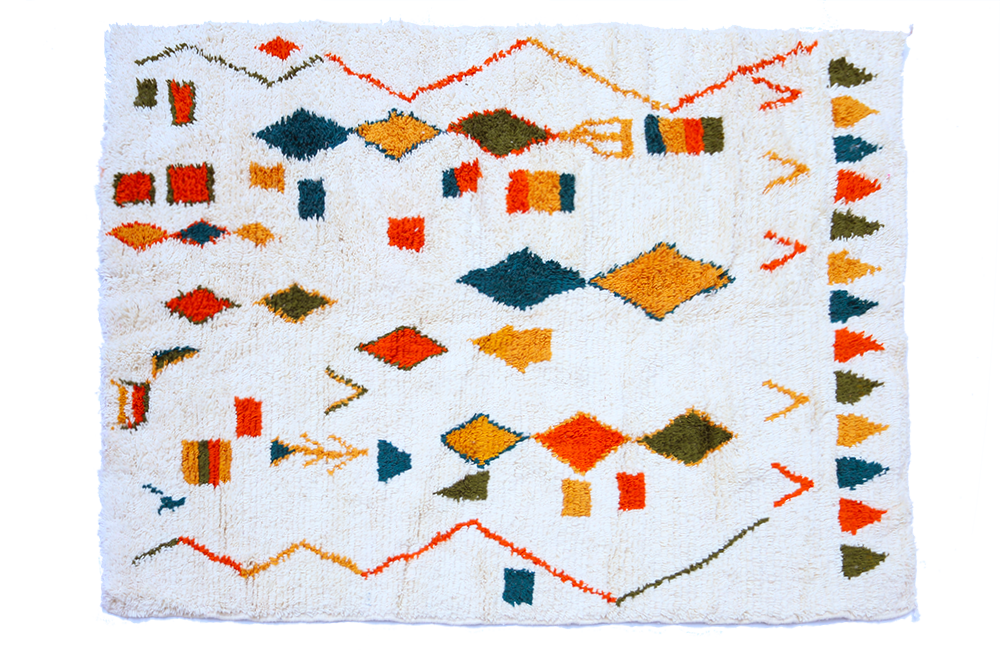 Large white Azilal Berber carpet with zigzags and lozenges coloured in pink green yellow and terracotta