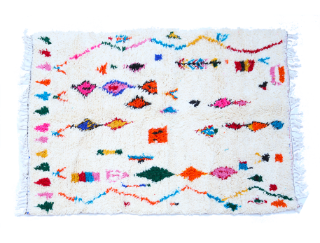 White Azilal Berber carpet with lozenges and zigzags coloured in pink green blue terracotta and yellow