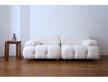 Two seater white curly wool sofa