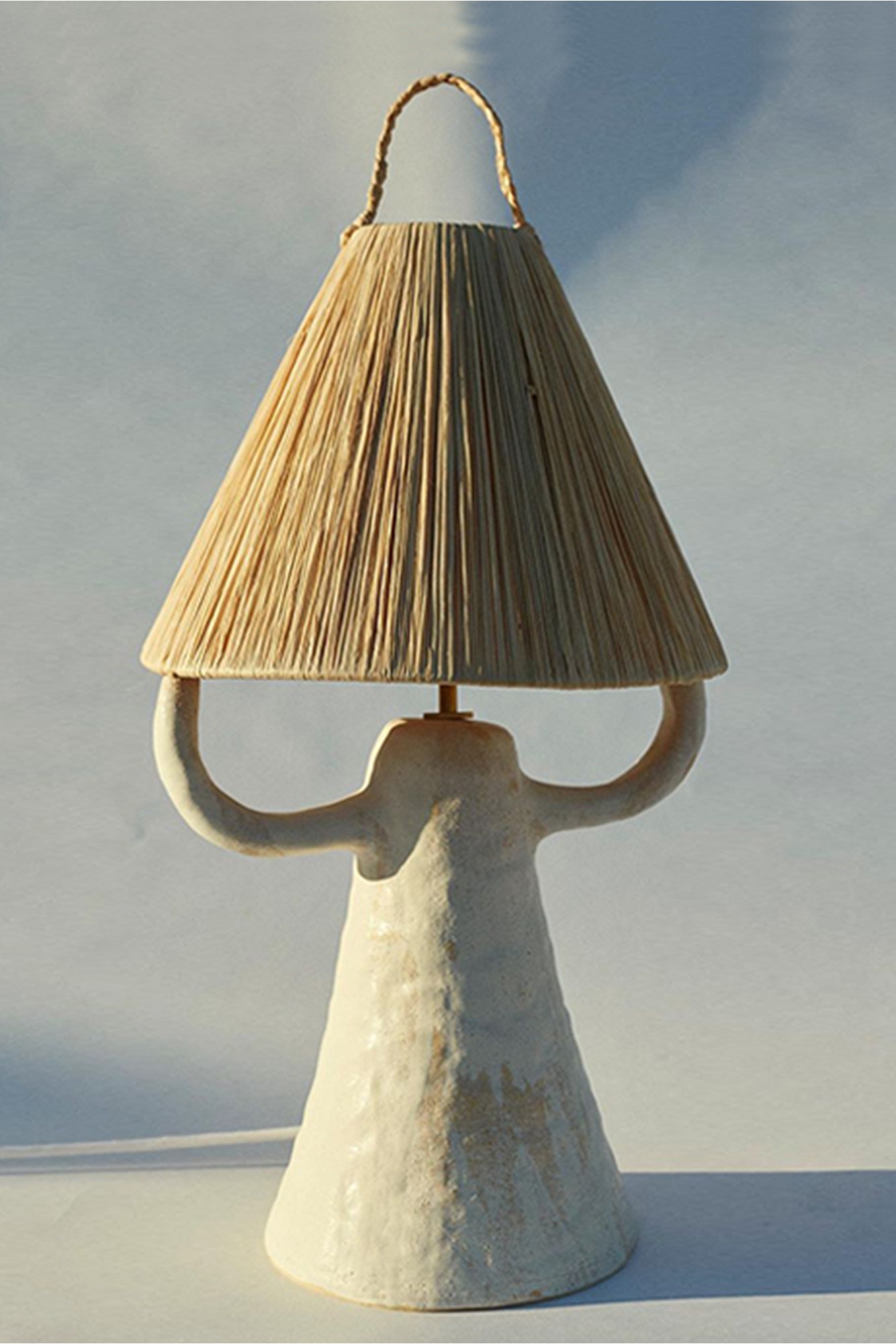 Lampe céramique et feuille de palmier l